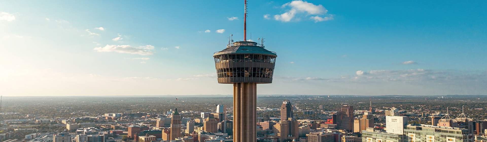 Visit_San_Antonio_Skyline_76872129-5f57-4e33-a23b-4f93672d4f65 - San Antonio Deck and Fence Works Metal observation tower, cityscape background.-deck builder-San Antonio, Texas